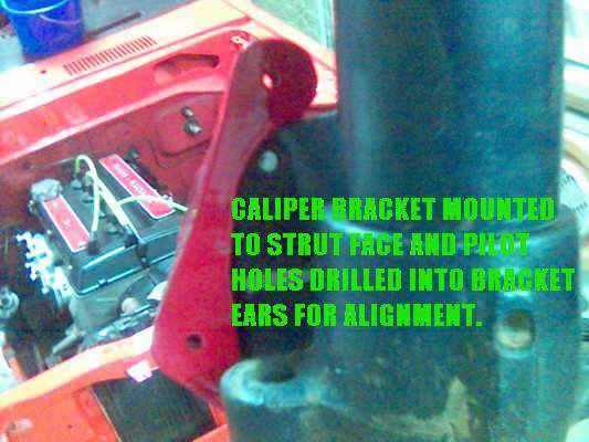 Caliper bracket on strut