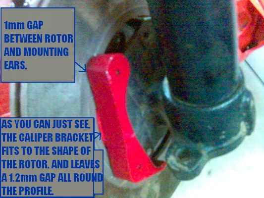 1mm gap between caliper bracket and rotor